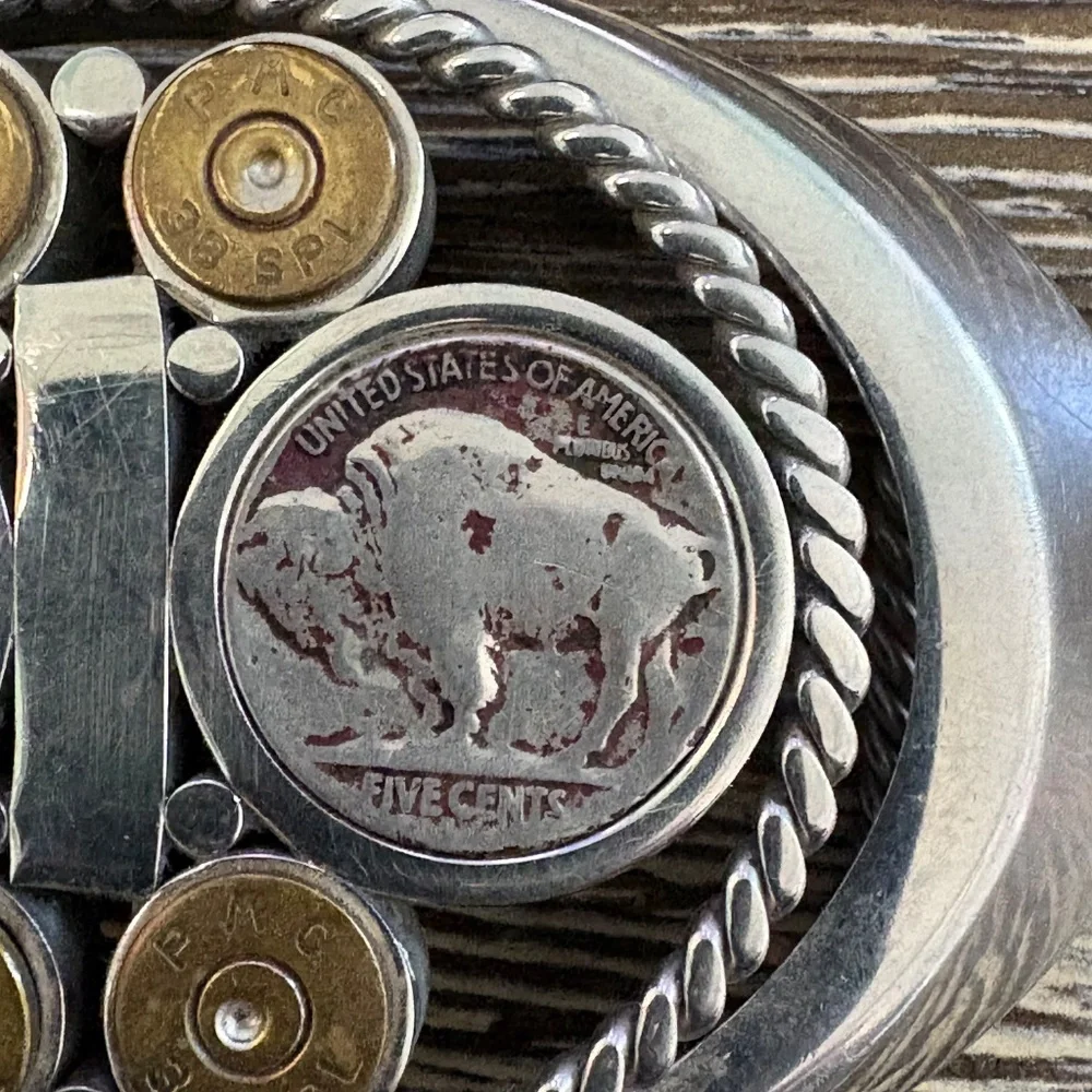 Vintage custom belt buckle featuring Buffalo nickels and brass bullet casings